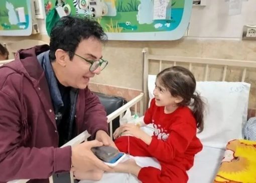 دیدار عموپورنگ با کودکان بیمار و مجروح شده در جنگ